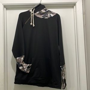 Size 2XL hooded sweatshirt, purchased from boutique. No tags but never worn.